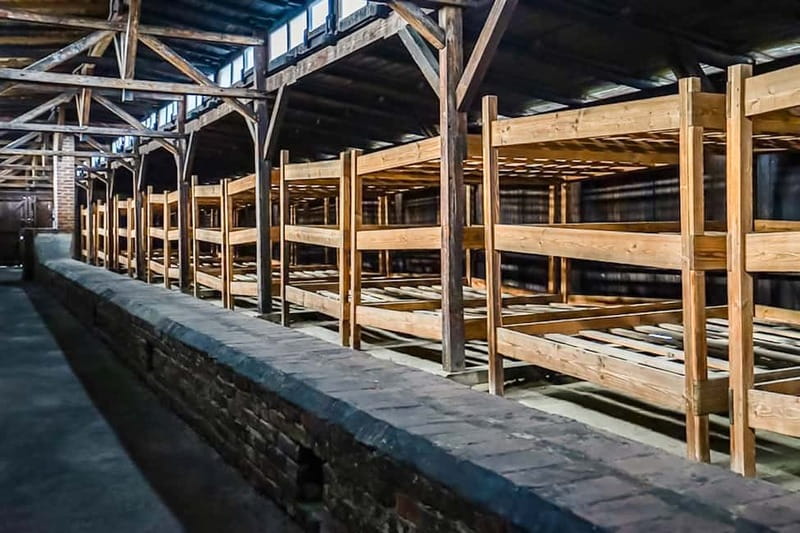 Auschwitz-Birkenau Skip-the-Line Guided Tour - Entering Auschwitz I through the Arbeit Macht Frei gate