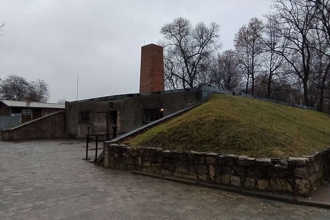 Auschwitz Museum and Salt Mine Tour with Private Transport - Wieliczka Salt Mine at 135 meters below ground