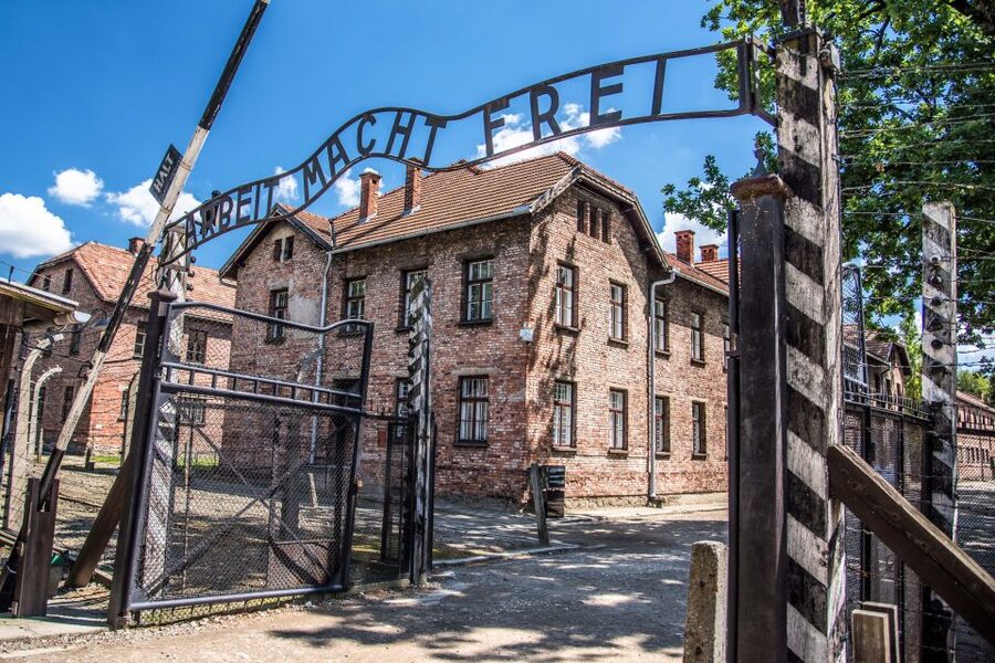 Auschwitz Ticket and Full-Day Tour from Krakow - Entering Auschwitz I and meeting the guide