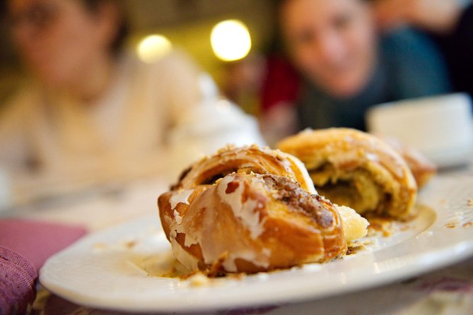 Discover Poznan: Walk, Take a tram and have a traditional snack - Starting under the Town Hall with Poznań’s goats