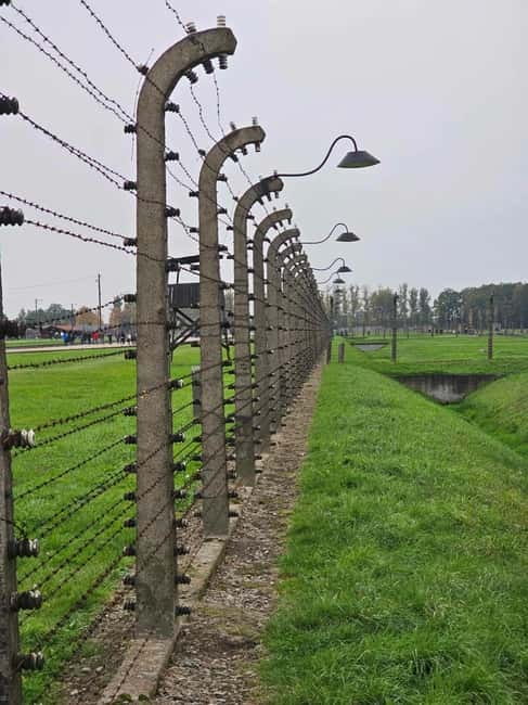From Krakow: Auschwitz-Birkenau Guided Tour with Pickup - Auschwitz I: barracks, exhibits, and the first guided visit