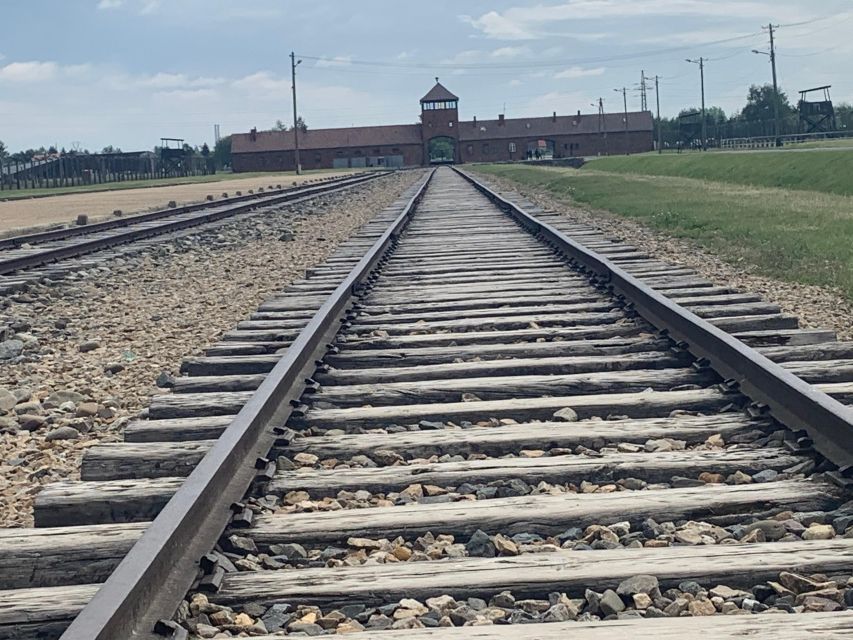 From Krakow: Guided Auschwitz-Birkenau Group Tour by Minivan - Food, breaks, and the return to Krakow