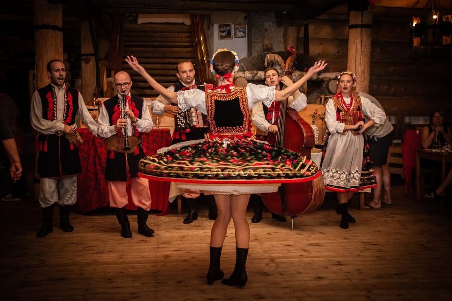 From Krakow: Polish Folk Show with All-You-Can-Eat Dinner - Transport, timing, and the cash tip