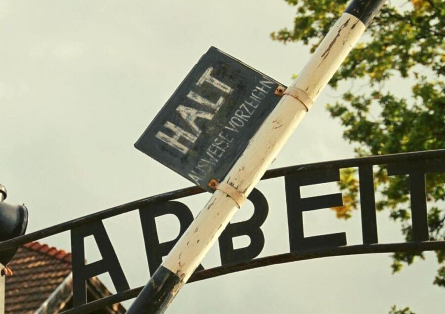 From Warsaw: Auschwitz-Birkenau Small Group Tour with Lunch - Entering Auschwitz and seeing the Arbeit Macht Frei gate