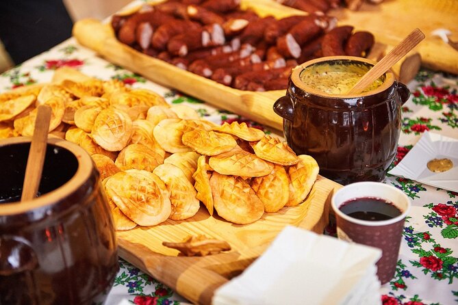 From Zakopane Snowmobile Ride with Bonfire and Transfer - Morning bonfire, sausage, and local drinks