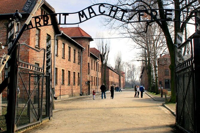 Full-Day Tour of Auschwitz and Wieliczka Salt Mine from Krakow - Wieliczka Salt Mine: steps, chambers, and salt carvings