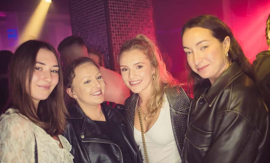 Fun explorers pub Crawl with 1 hour open bar and 3 VIP clubs - Walking through Krakow’s Old Town between stops