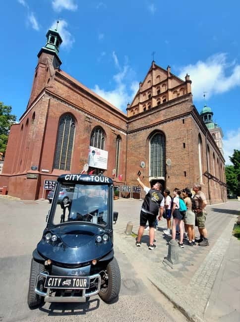 GDANSK City Tour by Golf Cart Live Guide & Sightseeing 90min - Reaching the old Hanseatic Port