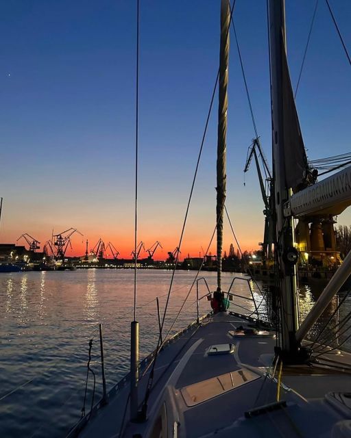 Gdańsk: Scenic Sunset Cruise with Welcome Drink - Past Stadion Energa Gdańsk and toward the sea