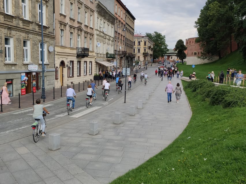 Krakow: Multilingual Tour On Electric Bikes - Riding through Krakow’s Old Town