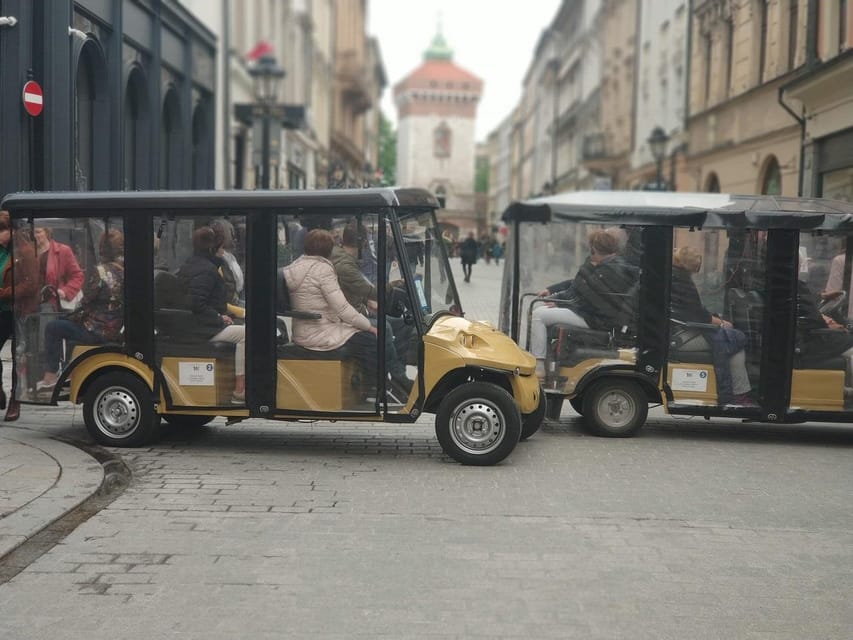 Krakow: Old Town Sightseeing Tour by Electric Golf Cart - Audio guide, seating, and the group format