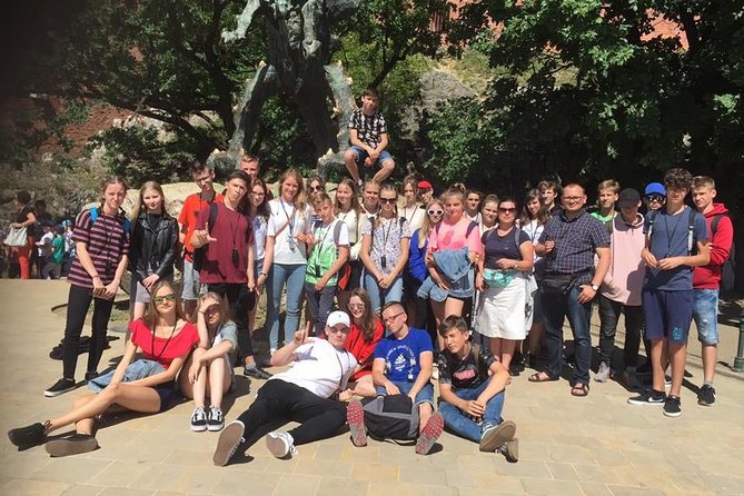 Krakow Old Town Walking Tour - Beginning beneath the Town Hall Tower