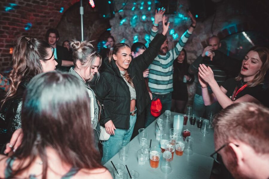 Krakow: Pub Crawl with 1 Hour of Unlimited Alcoholic Drinks - VIP entry, welcome shots, and the value of $31
