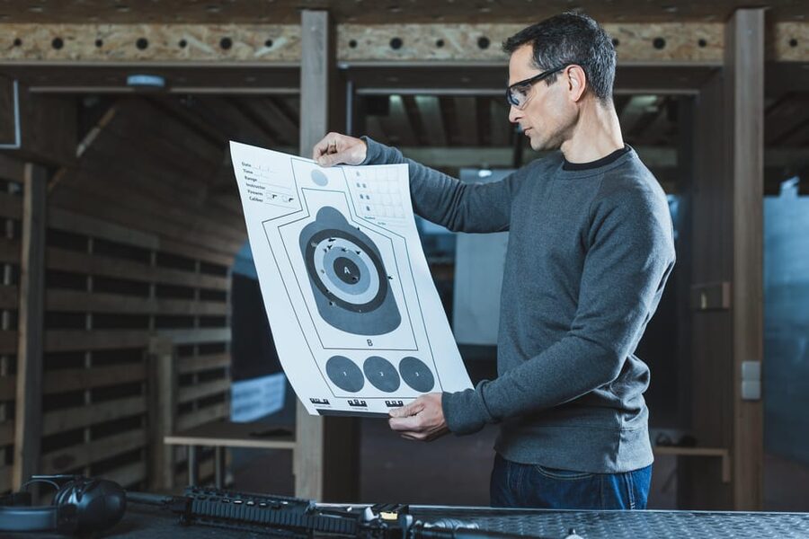 Krakow: Shooting Range & Hotel Transfers - Soldier 25 Shots - The target, the beer, and the photo finish