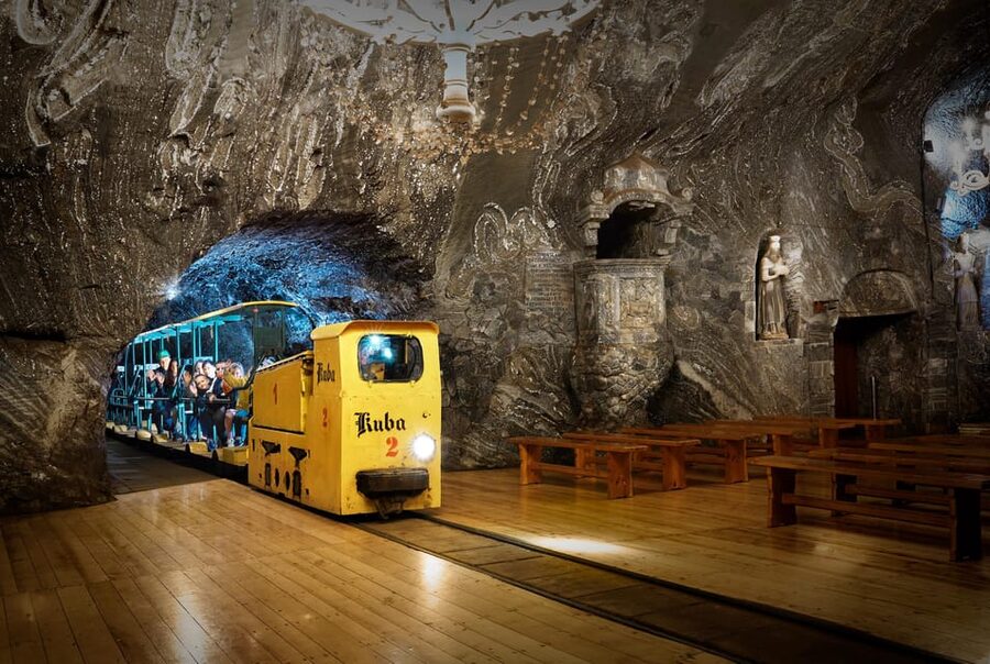 Krakow: UNESCO Underground Boat Expedition & Salt Mine Tour - Entering the mine with an audio guide