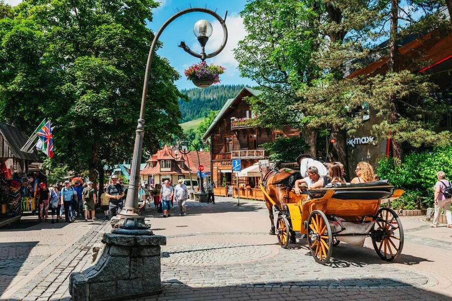 Krakow: Zakopane Tour with Thermal Baths, Cable Car & Pickup - Riding the Gubałówka funicular