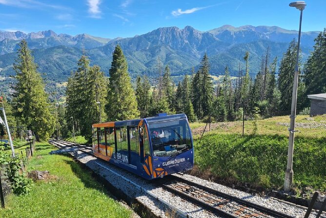 Private Full-Day Zakopane and Thermal Baths Tour from Krakow - Gubałówka rises above the town