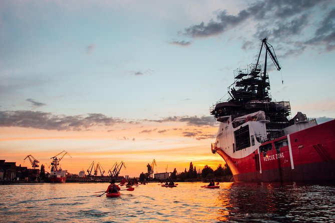 Sunset Kayak Tour - Paddling past the Crane