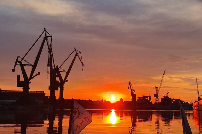 Sunset on the Shipyard and Old Town Evening Cruise - The shipyard: cranes, working water, and Solidarity-era context