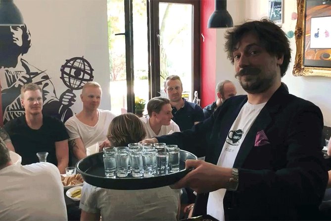 Taste the Best Polish Vodkas in Warsaw with a local Expert - Pickled vegetables and herring on the table