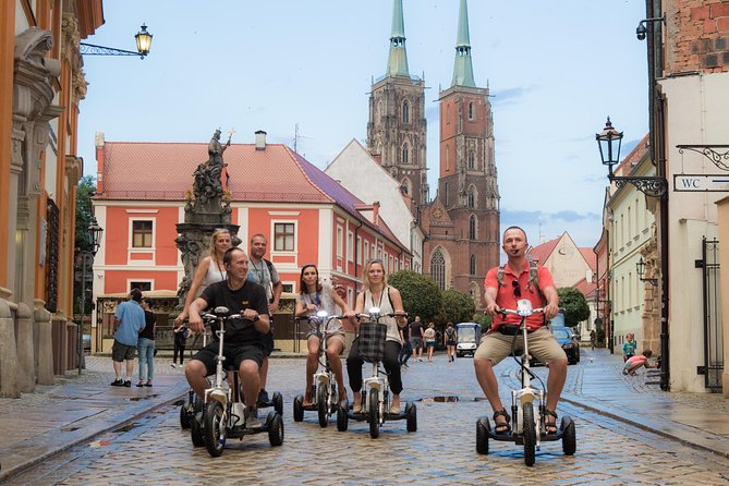 The Classic E-Scooter (3 wheeler) Tour of Wroclaw - everyday tour at 6:00 pm - Starting at Kotlarska Street at 6:00 pm