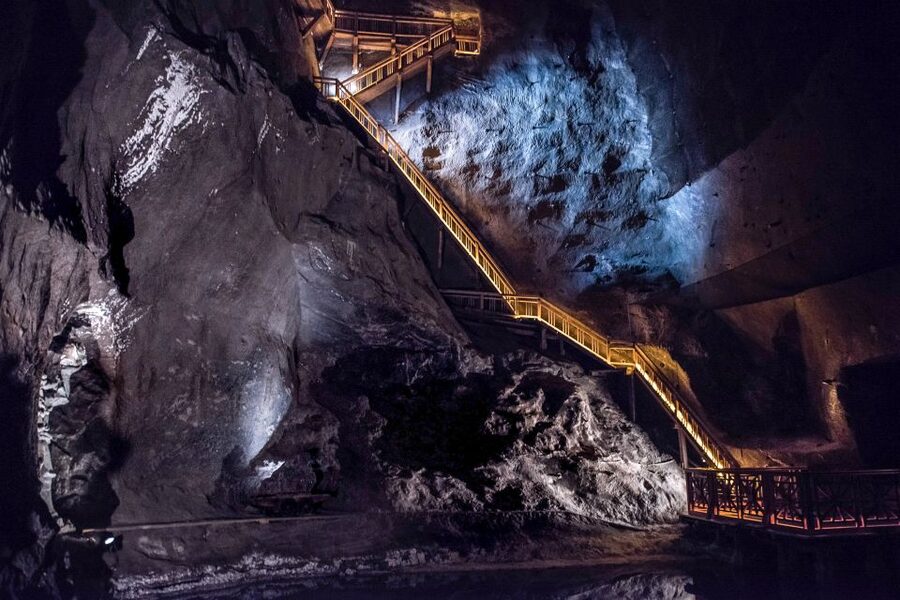 Wieliczka Salt Mine Tour Including Hotel Pick-Up - Salt statues, mining tools, and underground chapels